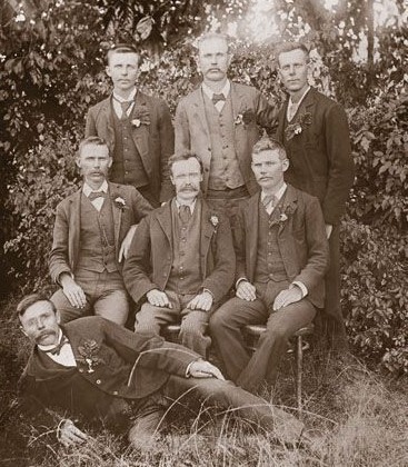 Reimer Wenck with his sons, (back) Gustav, Carl, Adolph (seated) Ernst, Reimer,Theodor (front) Johann - 1894 Source - J. Crockett